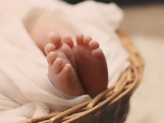 Baby's feet pressed together