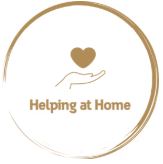 Golden brown circle with a heart hovering above a hand over the words Helping at Home