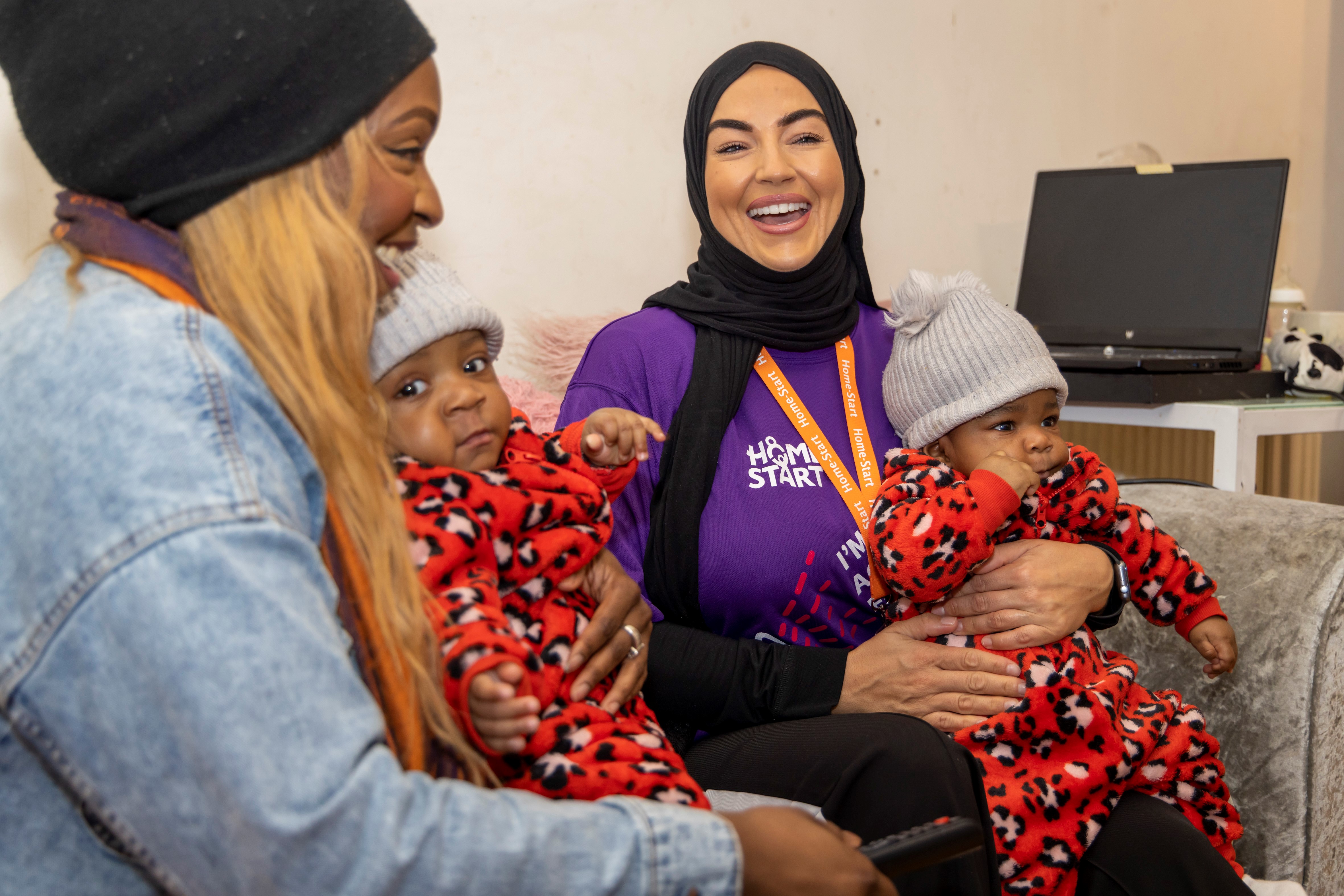 a Home-Start volunteer with a family