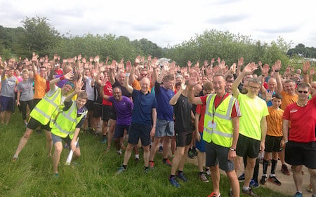 Parkrun event photo crowd of runners